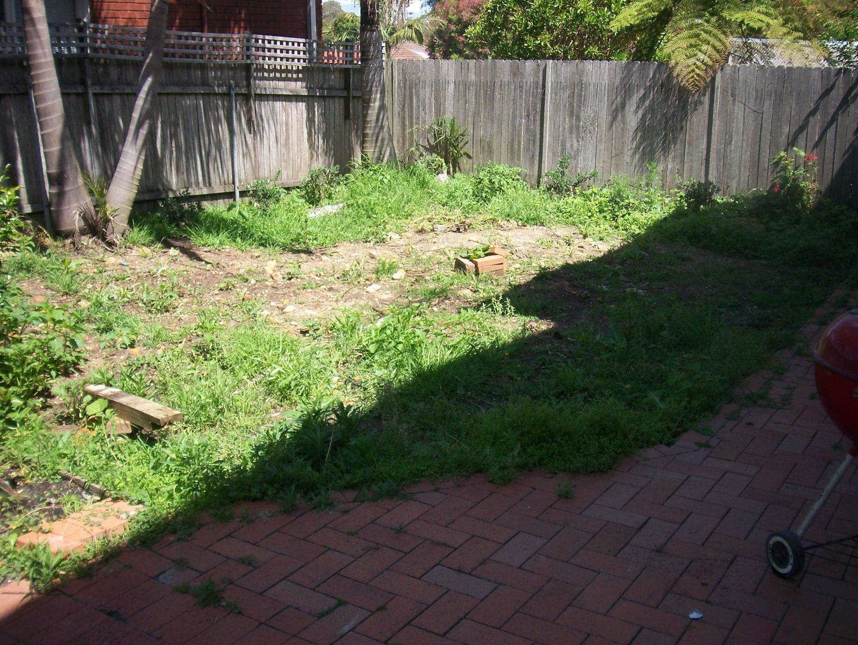 Backyard cleanup or Tidy up, weedy area before garden edging and new turf laying Wollongong IllawarraNew South Wales