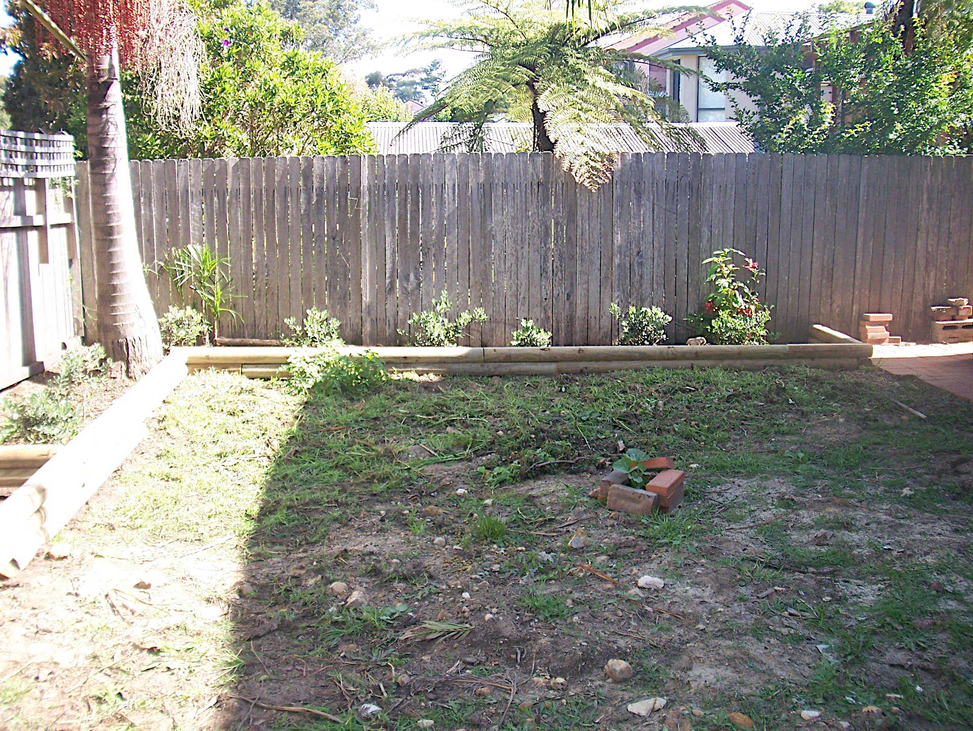 Treated Pine Slabs used as Garden Edging before new turf is laid. Backyard Tidy up, Garden Renovation, Yard Clean up Wollongong New South Wales