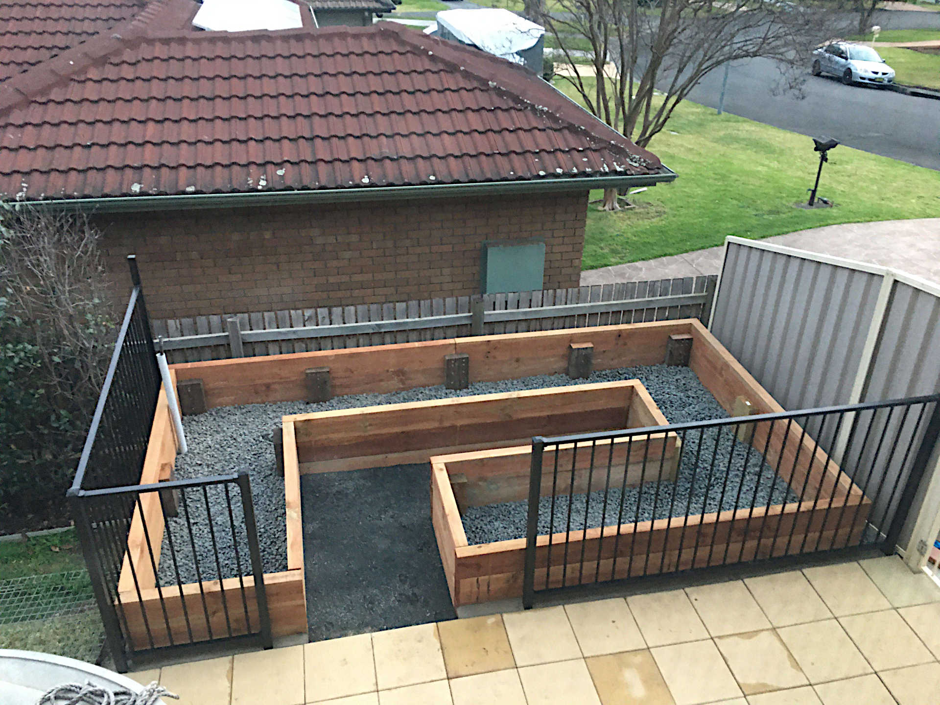 Treated Pine Raised Vegetable Garden Bed with aggregate for drainage and compacted metal dust foundation for paving Figtree Wollongong NSW