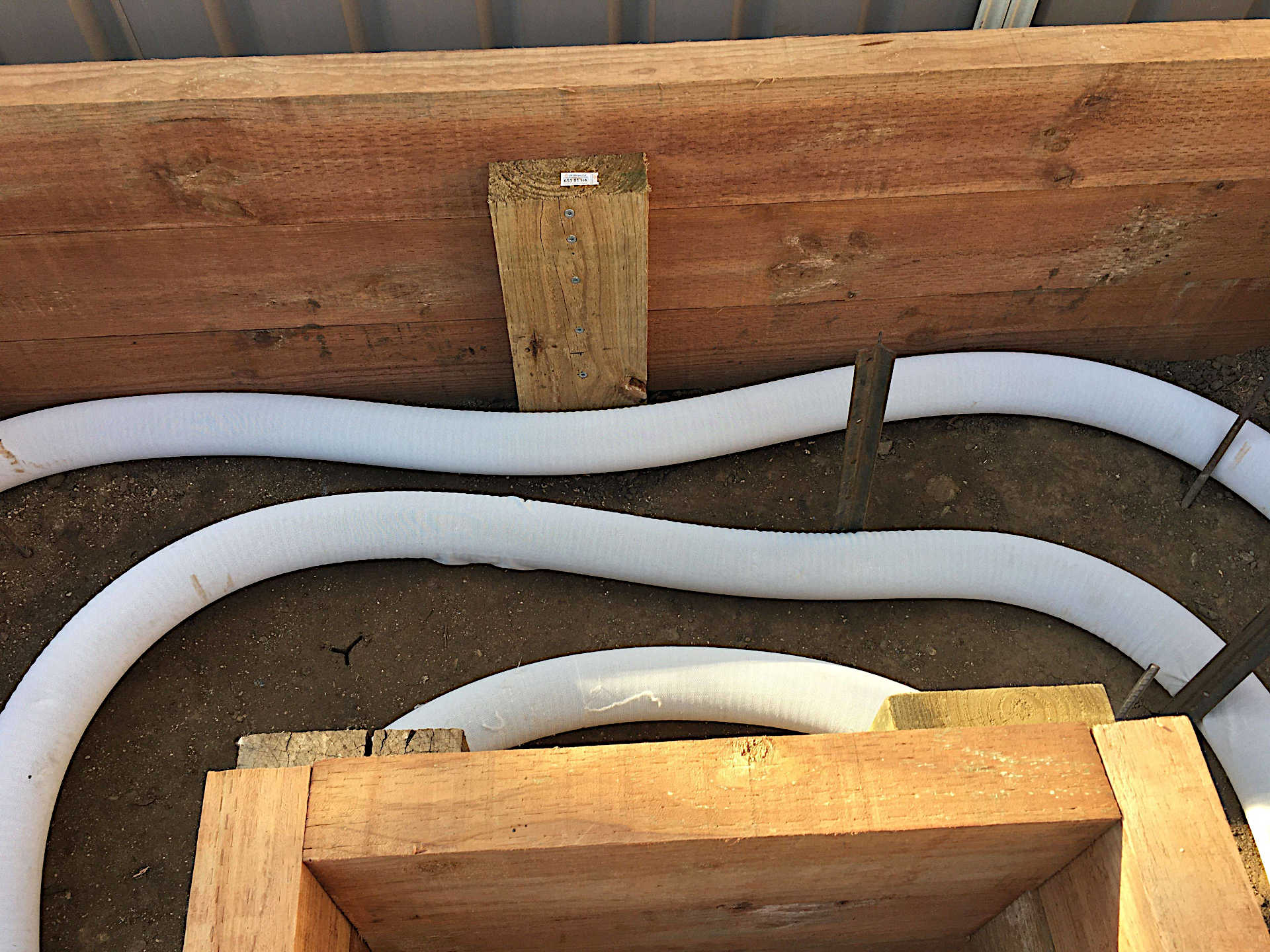 100mm socked Agi line drainage installed and connected for raised Vegetable Garden Figtree Wollongong NSW