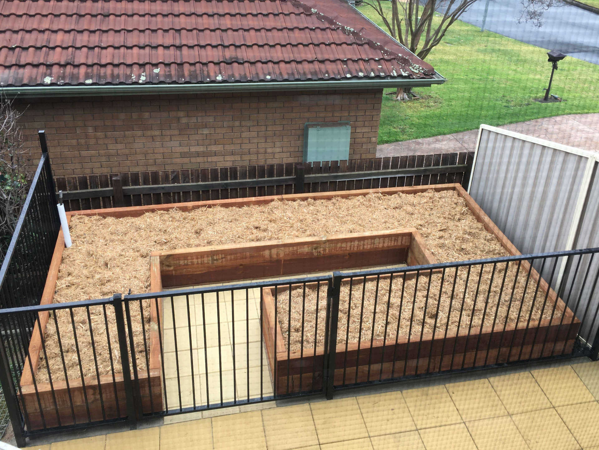 Treated Pine Raised Vegetable Garden with paving filled with Compost and Mushroom Compost Sugar Cane Mulch Figtree Wollongong NSW